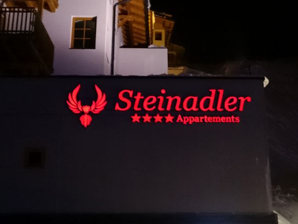 Steinadler Appartements Obertauern - Alu-Frontleuchter Nachtansicht