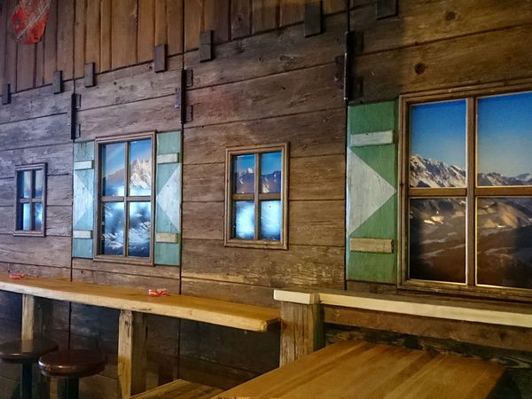 Dampfkessel Flachau - Fensterbeschriftung mit Panoramafoto gedruckt auf Hochleistungsfolie